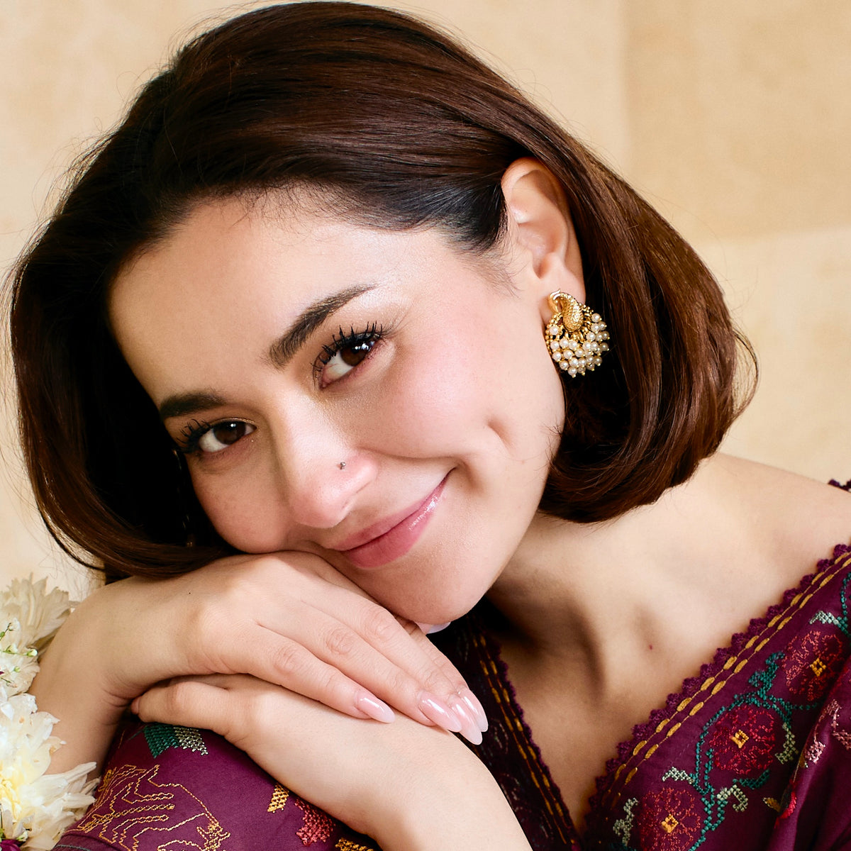 Hania Amir wearing Sunehri gold plated peacock pearl stud earrings