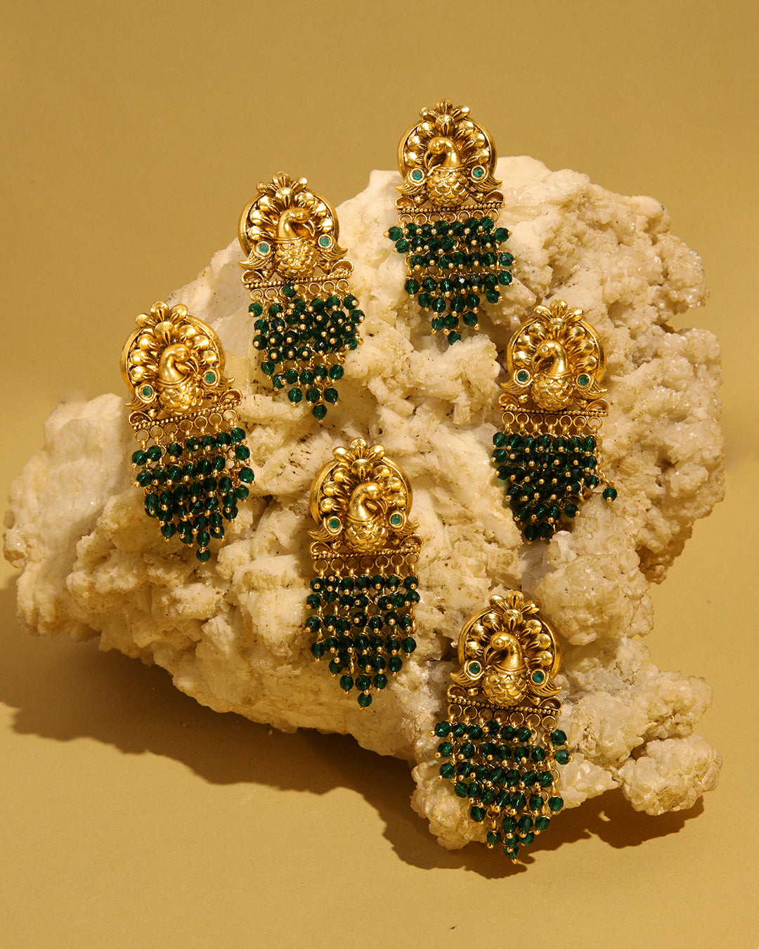 Sunehri gold tone earrings with green peacock motif, view 4
